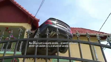 Noua fiţă în arhitectura din România: Audi "împlântat" în faţada casei (FOTO)